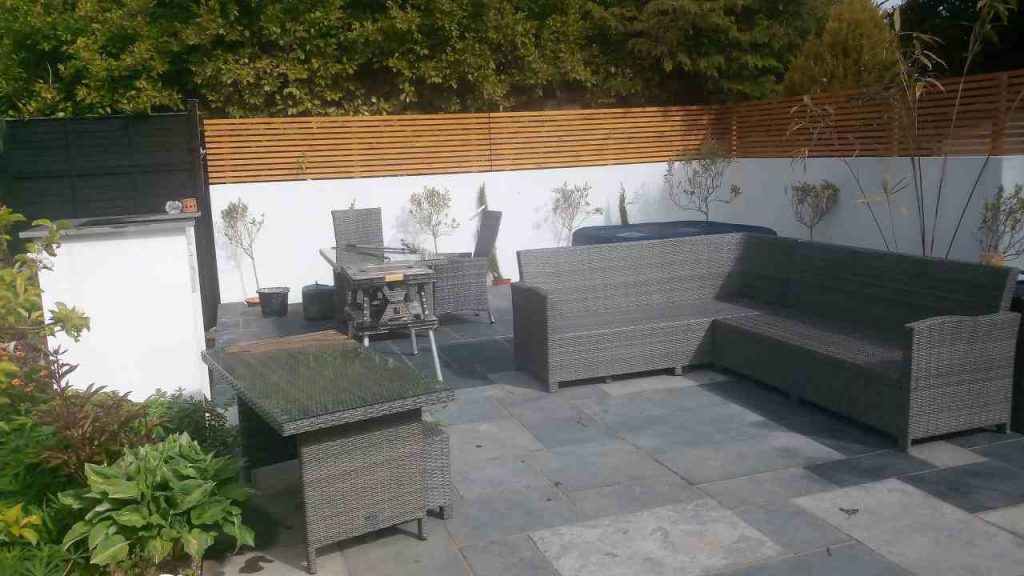 finished limestone patio with garden furniture