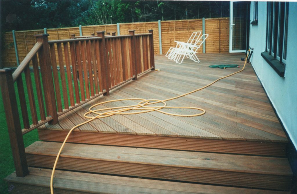 Hardwood decking with steps and handrails Surrey