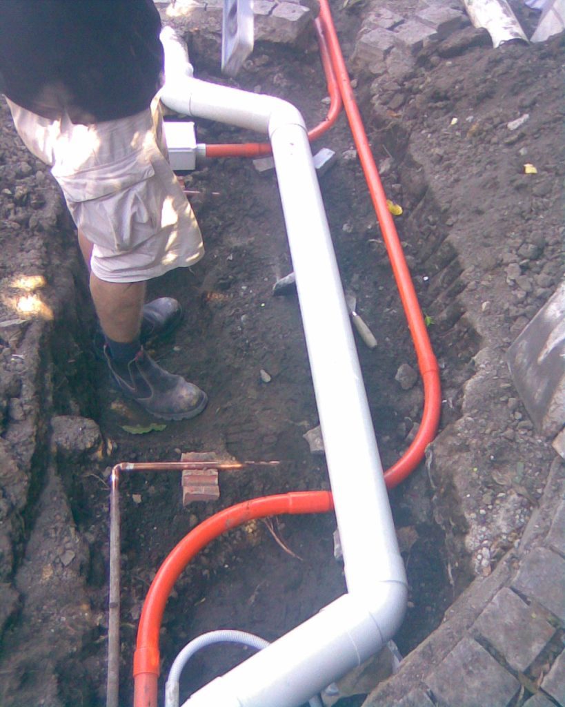 Re-routing gas pipe supply and stormwater pipe in garden in Sydney for landscaping project