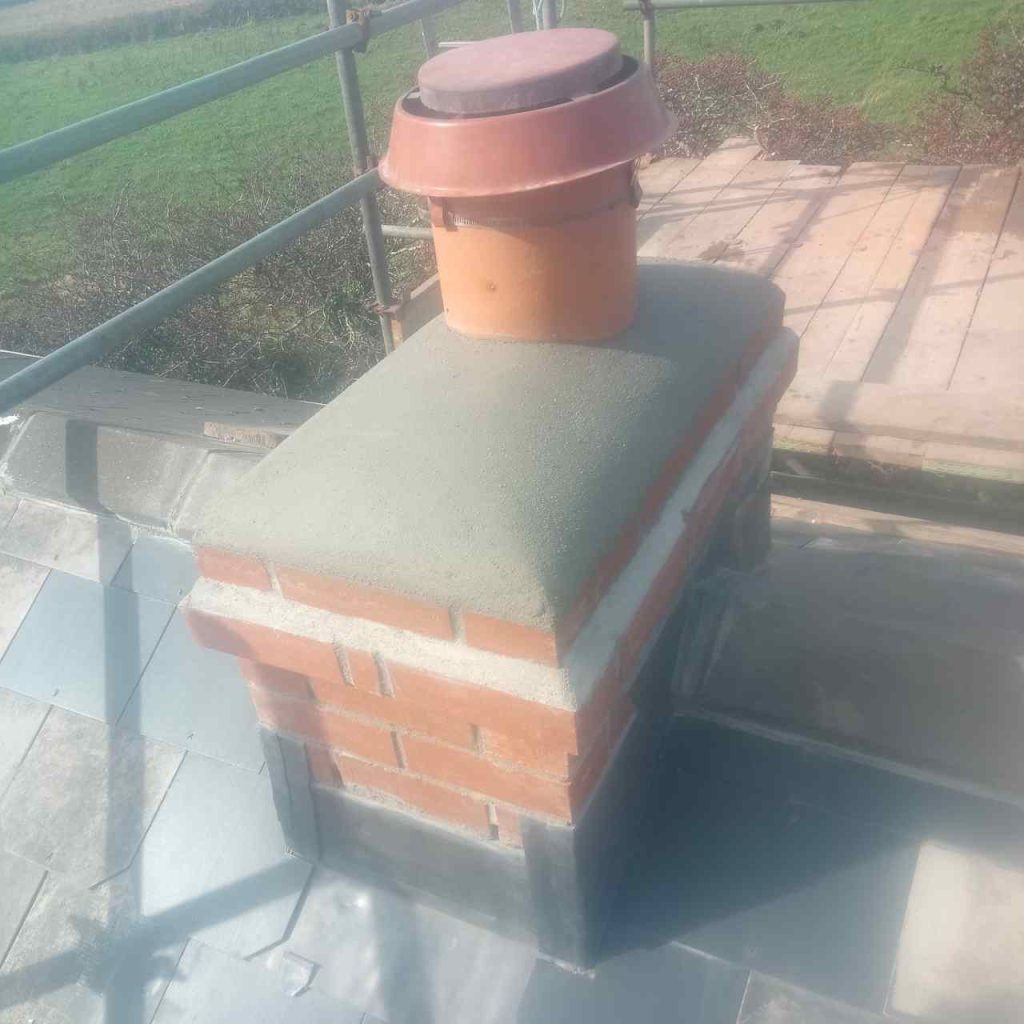 Chimney stack rebuild with lead flashing and tray
