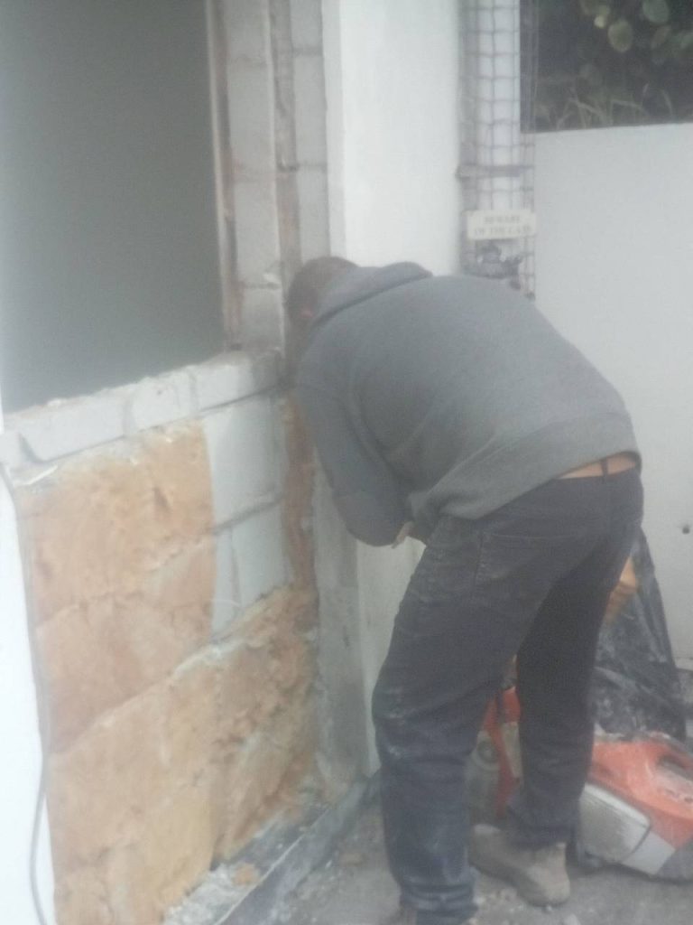 Taking out block work to create new opening for French door