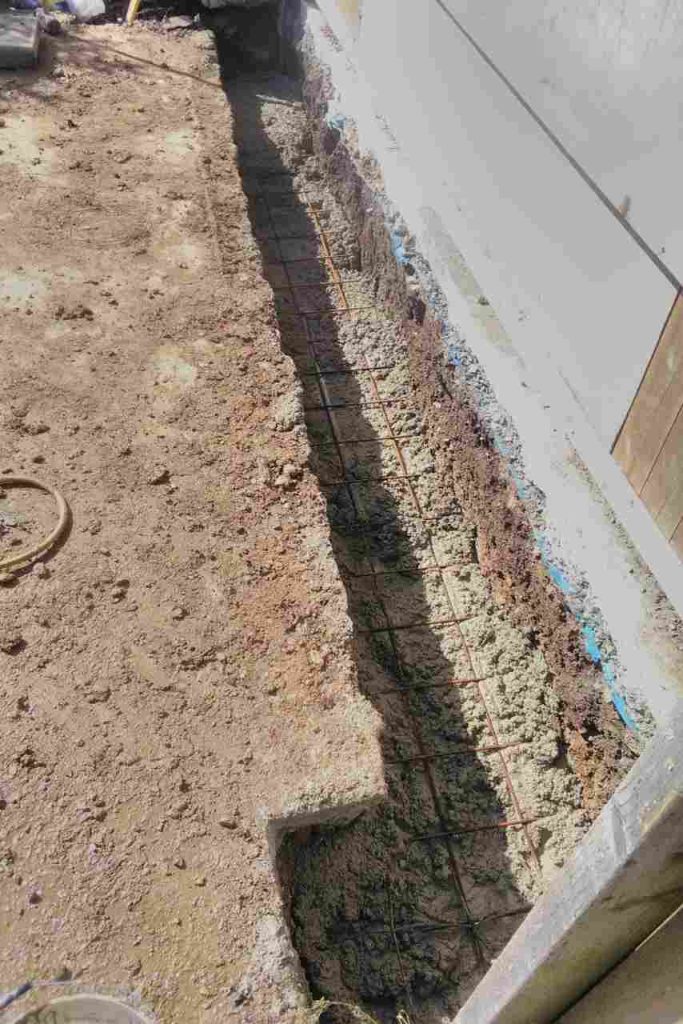 Excavation for boundary wall with steel reinforcement