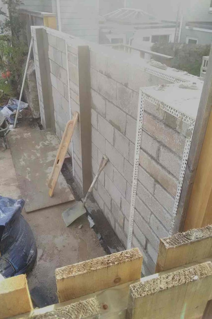 Block work with render profiles for garden boundary wall