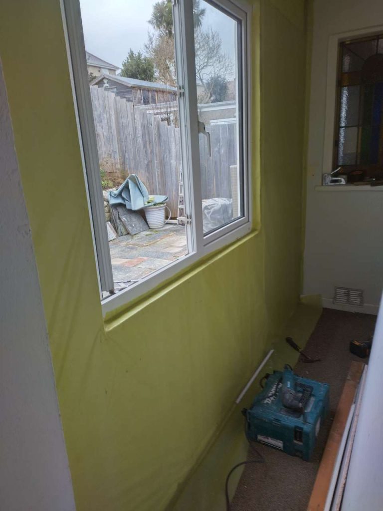 Interior studwork with vapour barrier before plasterboard