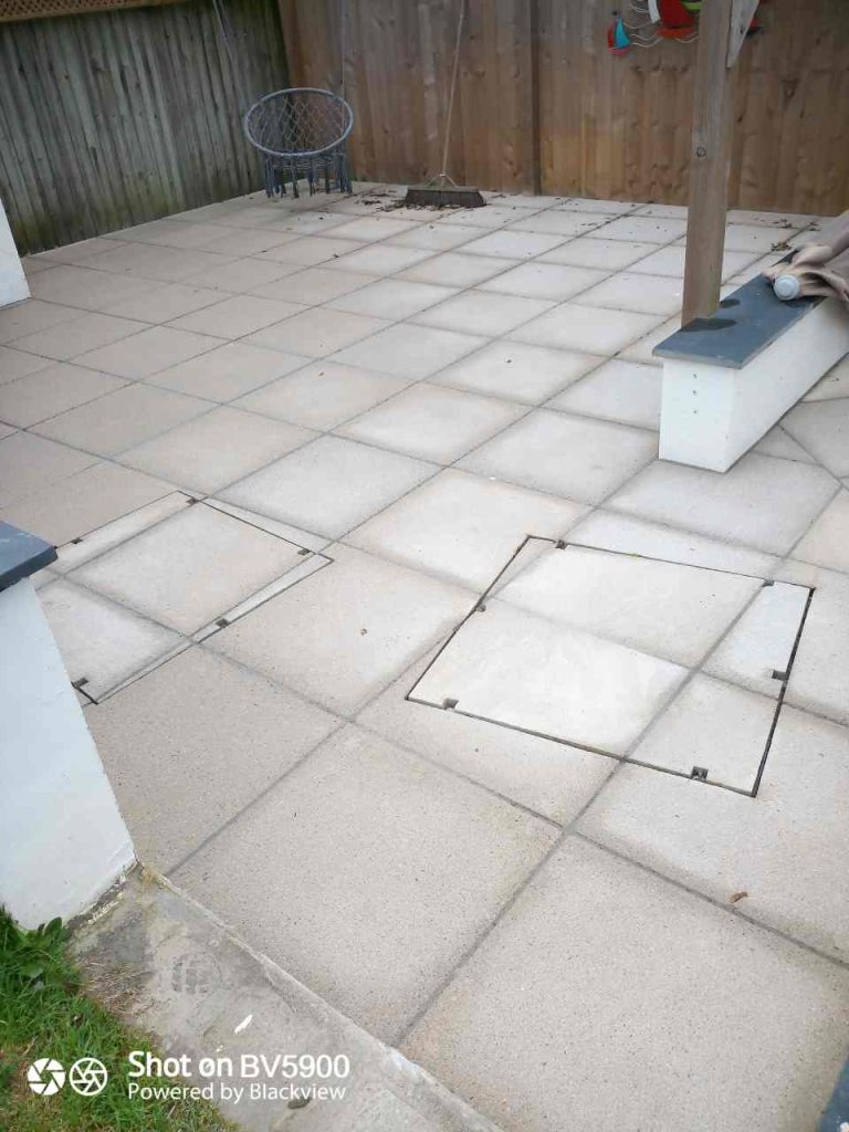 precision paving cuts around concealed manhole tray
