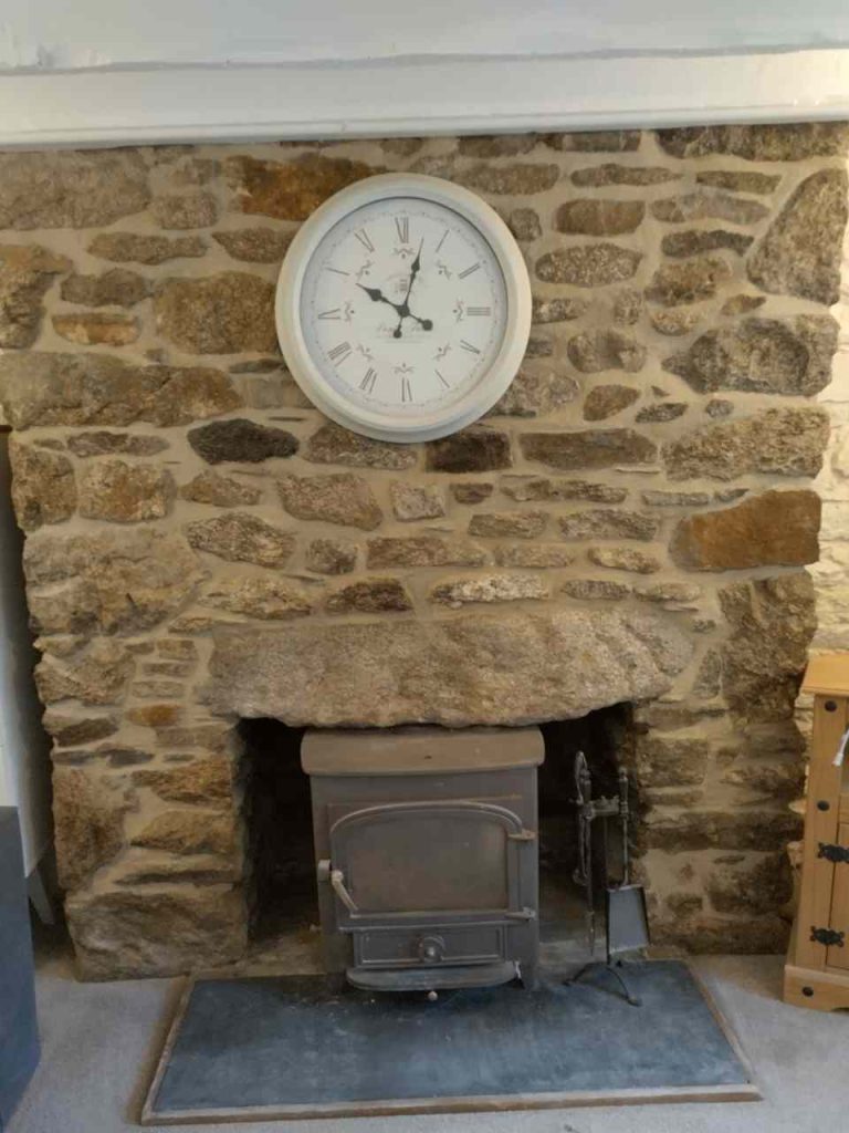 Lime re-pointing internal fireplace and stones needle gun cleaned