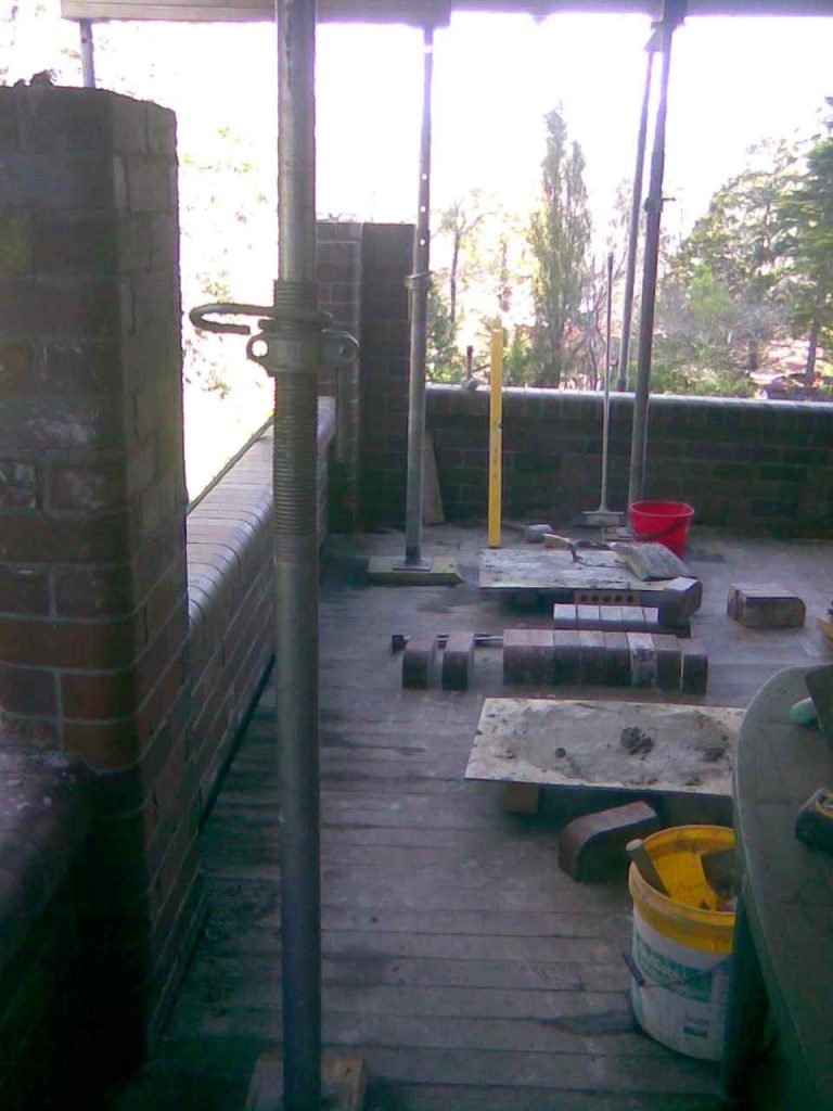Veranda repair Springwood, Blue Mountains, NSW Australia. New brick piers going up